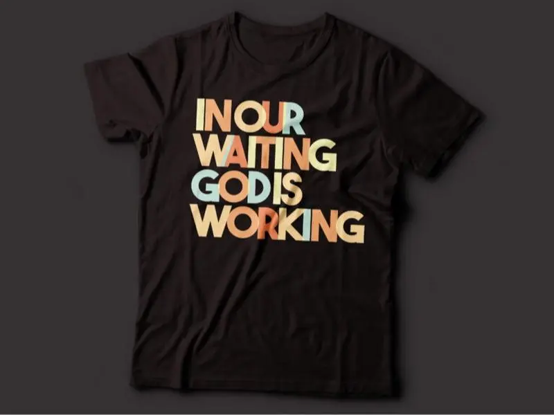 N Our Waiting God Is Working Multicolor Text Design T-Shirt
