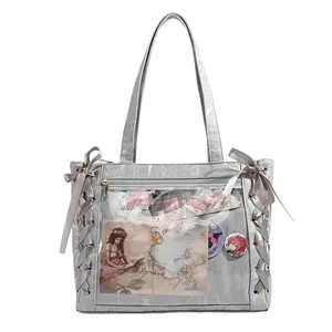 RIVERICH Ribbon-Tie Ita Bag for Anime & K-Pop Fans - Shoulder Bag with Decorative Bow Straps & Clear Display Window, Aesthetic Fandom Purse features removable ribbon accents for customizable styling, perfect for showcasing your enamel pins and photocards