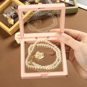 3D Floating Display Box, Dustproof Jewelry Packaging, Transparent Hanging Storage Box for Storing Necklaces, Bracelets, Rings, Coins, Earrings, and Pins, with Elastic Film, Gift Box for Retail and Personal Use.