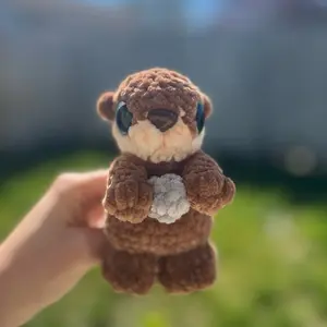 Hand crocheted baby otter