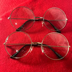 Clear Round frames trimmed in silver or gold. Arms have a protective layer for a comfortable fit around your ears