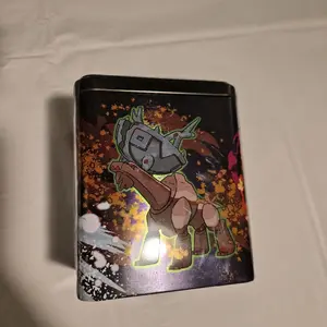 Pokemon Scarlet & Violet 2025 Ogerpon Stacking Tin (3 Booster Packs & 2 Sticker Sheets) Collectible Trading Cards Authentic Collectible Cards
