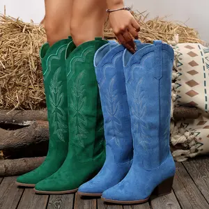 Women's boots, featuring intricate embroidery on the upper, expertly stitched by hand, slip-on design, mid-calf height, thick heel, purely handmade insole, soft and comfortable, suitable for everyday wear, travel, and parties