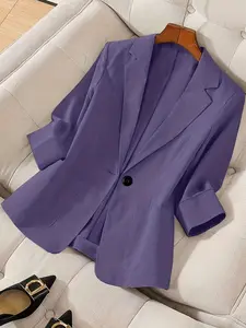 A women's solid color lapel single-breasted single-button mid-length sleeve double-pocket stylish fitted blazer, suitable for spring and summer, appropriate for the workplace and daily wear.