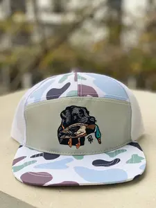 Camo Trucker Hat with Embroidered Black Lab Holding Duck – Mesh Back Hunting Cap, Snapback Adjustable, Waterfowl Retriever Dog Design for Outdoorsmen