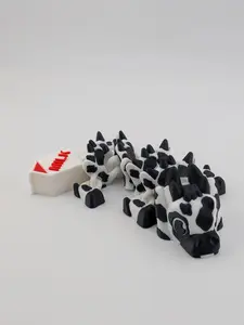 Mini Cow Flexi Dragon 5.62" of Moo Magic Adorable Flexi Dragon with Cow Spots and Milk Carton Tail Charm Perfect for Fidgeting Collecting or Gifting