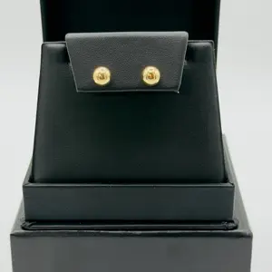 Sleeping Earrings or 10 K Balls - Elegant Gold-Tone Studs in Sleek Black Case
