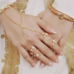 Gold Hand Jewelry - Elegant Design with Gold Accents and Simple Pendant