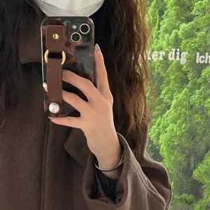 Fashionable Phone Case with Pearl Wristband, Full Body Shockproof Phone Protective Cover, Phone Accessories Compatible with iPhone 16 Pro Max 15 Casing