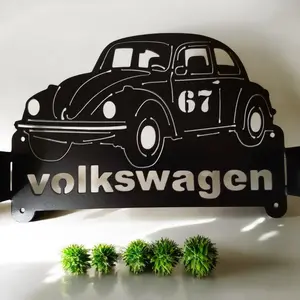 Custom-made shop rag holder with the picture of a Volkswagen on it.