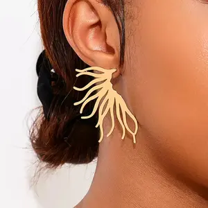 Boho Ocean Wave Earrings 	•	Statement Gold Dangle Earrings 	•	Abstract Flow Earrings 	•	Beach Style Drop Earrings 	•	Minimalist Gold Wave Earrings