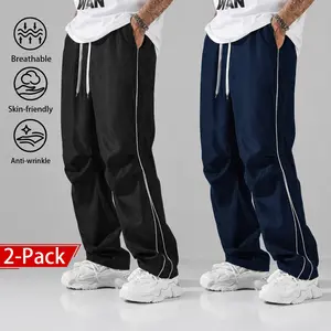 2-pack street-style men’s athletic pants featuring side stripes; casual loose fit, drawstring high waist, straight legs; breathable, skin-friendly, wrinkle-resistant, lightweight. Suitable for everyday wear, fitness training, street fashion, and outdoor l
