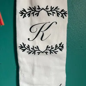 Custom dish towel and sticker with last name