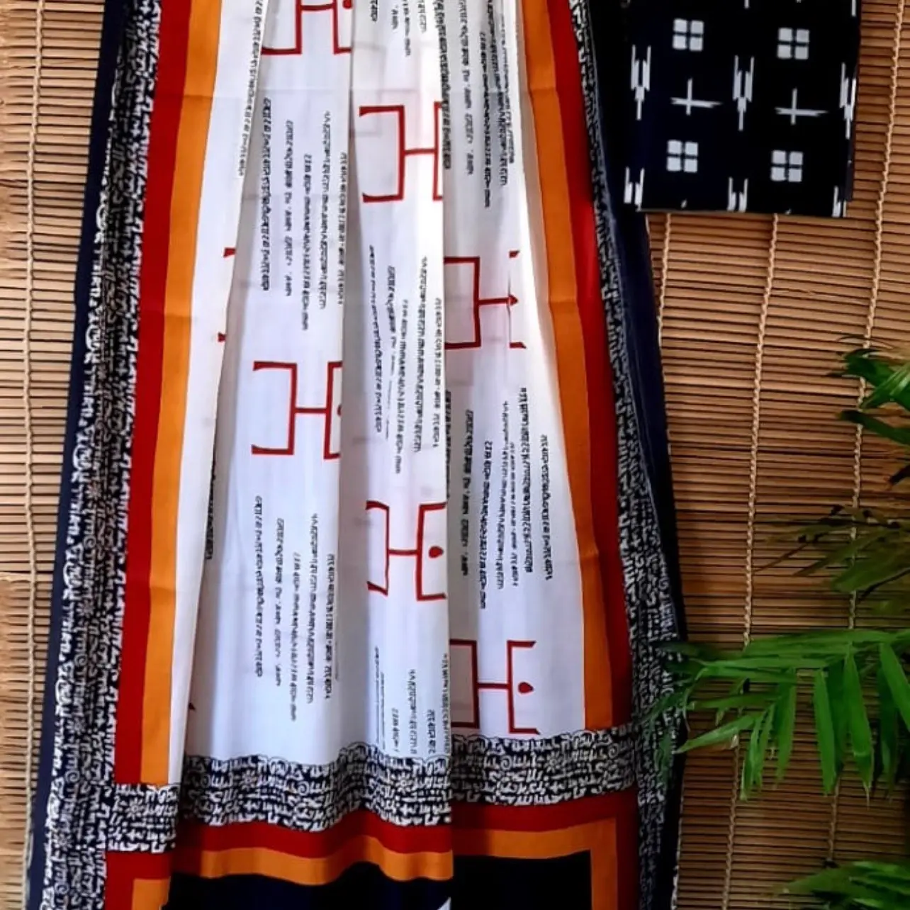 Newspaper print saree with unstiched blouse piece