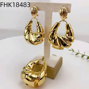 thee piece earrings and pendant 18k gold plated