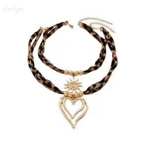 Boho Leopard Print Layered Choker Necklace - Gold-Tone Heart & Sun Pendant, Adjustable Costume Jewelry for Casual & Festival Looks