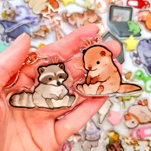 Sitting Otter & Raccoon Acrylic Keychains Set – Cute Animal Couple Charms, Adorable Matching Keyrings, Gift for Otter Lovers & Friends