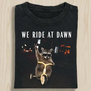 We Ride at Dawn Shirt, Funny Racoon Shirt, Raccoon Riding Tee, Chaotic Shirt, Adult Humor Shirt, Unisex Oversized Cool Raccoon Tshirt, Made in USA , 100% Cotton