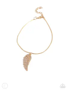Angelic Accent - Gold Angel Wing Charm with White Rhinestones hangs from Gold Snake Chain Anklet