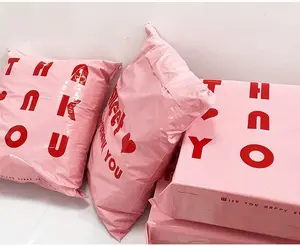 Pink shipping poly bag with cute text design, stylish for parcel packaging