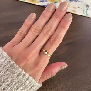 Mindful Pearl Fidget Ring with freely spinning pearl, gold plated