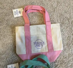 Trader joe's Mini canvas tote bag. pastel color. pink.