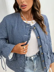 A women's short quilted jacket with blue and white polka dot print, drawstring bell sleeves, and a single-breasted design, featuring a retro and sweet casual style. It's suitable for relaxed yet stylish occasions such as daily shopping, casual coffee meet
