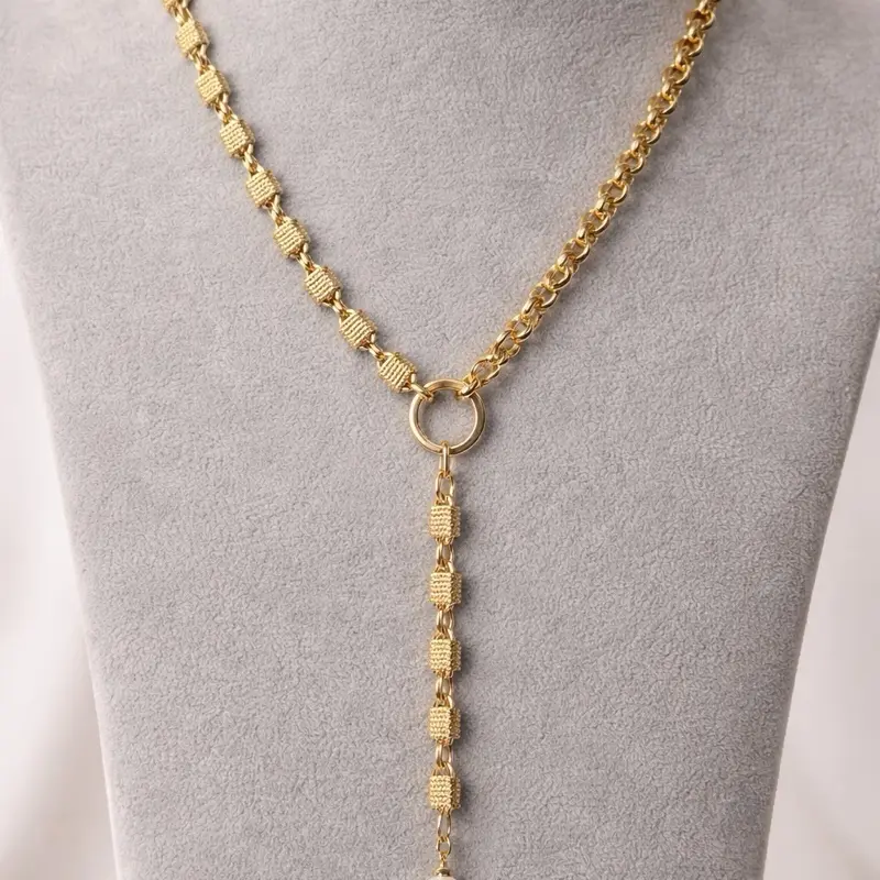 Elegant Gold Color Y-Shape tie Necklace with Textured Links and Central Ring Detail for Stylish Wear