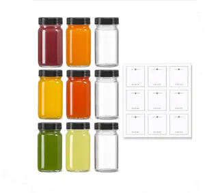 9 Pack 2 oz Glass Shot Bottles with Black Lids & 9 Labels - Small Clear Jar for Ginger Juice Cleanse - Travel Essentials Mini Bottles - Wide Mouth Leakproof Dishwasher Safe - Set - Beverage