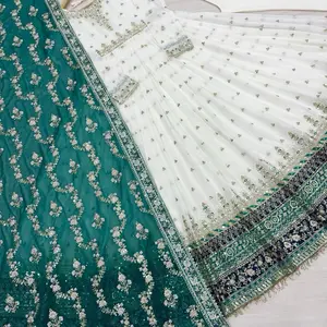 Indian Pakistani Traditional Dress with Red and White Color Scheme, Elegant Design, and Unique Patterns Indian Pakistani Traditional Dress with Red and White Color Scheme, Elegant Design, and Unique Patterns