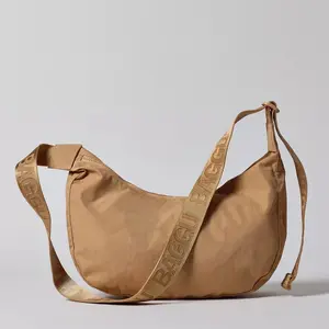 BAGGU Medium Nylon Crescent Bag - Practical Everyday Use with Adjustable Strap & Interior Pockets - Recycled Materials for Durability