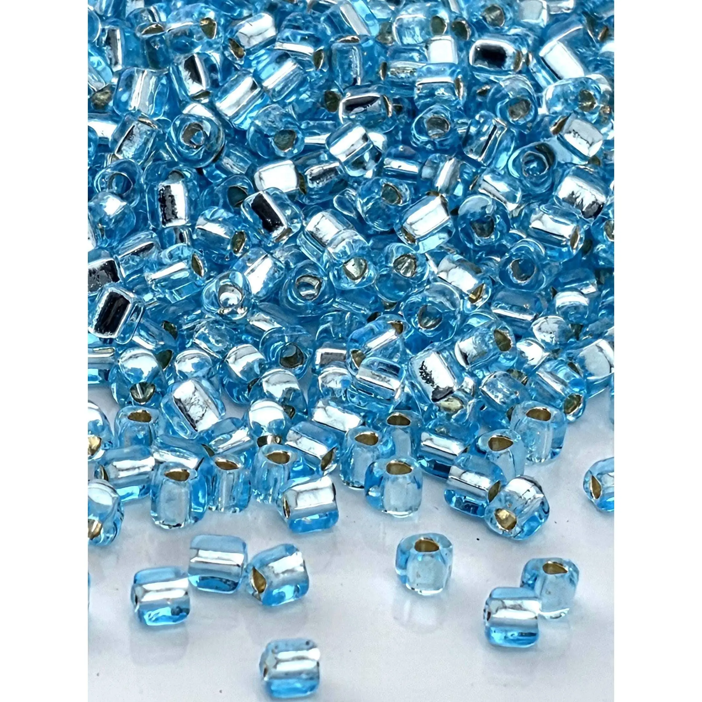 Miyuki Triangle Beads, Blue Topaz Silver Lined | 10/0 Size | Bead Weaving