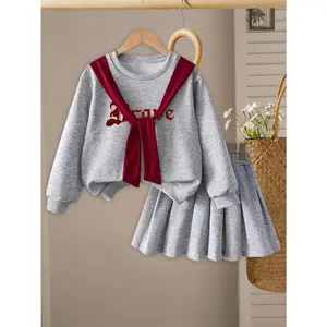 Spring and autumn style girls' college-style two-piece set: gray round-neck top with letter print paired with a burgundy bow tie and a matching pleated short skirt, suitable for daily outings, school activities, and other occasions