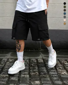Men’s cargo shorts — multi-pocket drawstring casual shorts made from woven fabric; essential for outdoor sports; stylish, versatile men’s summer casual shorts.