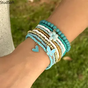 Women's Multicolor Stackable Elastic Bangle Jewelry Set - New Bohemian Floral Charm Design with Heart, Butterfly Pendants, Faux Pearls for Sports, Outdoor Wristband Bag Accessory