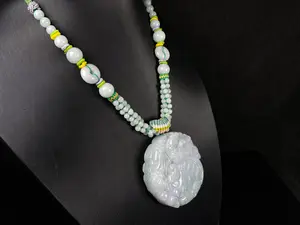 Phoenix Among Clouds · Natural Burmese Jadeite Pendant