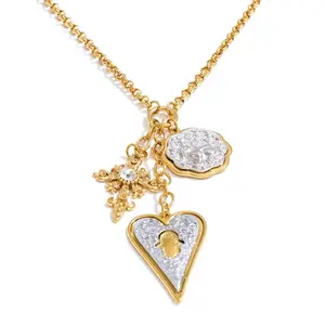 Collar Largo Corazón Imperial Doble Tono en Acero con Detalles Dorados y Charm de Flor