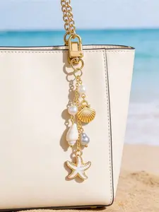 Seashell & Starfish Ocean Themed Keychain With pearl pendant and lobster clasp, decorative charm for bags and car keys. Beach style accessory for women and girls. Ideal gift for birthday, Valentine’s Day, Mother’s Day and beach lovers.