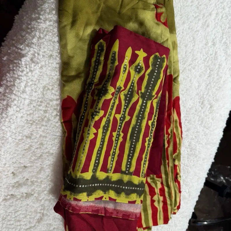 Samira Somali Baati - Traditional Somali Fabric with Vibrant Red, Yellow, and Green Patterns
