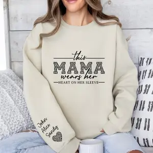 Custom Mama Sweatshirt With Kids Names On Sleeve, This Mama Wears Her Heart On Her Sleeve, Mom Christmas Crewneck Sweater, Mothers Day Gift for Mom