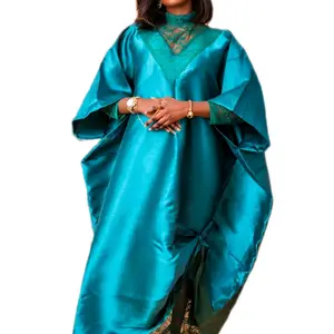 Rich Aunty Green stylish boubou with interior Green net lace