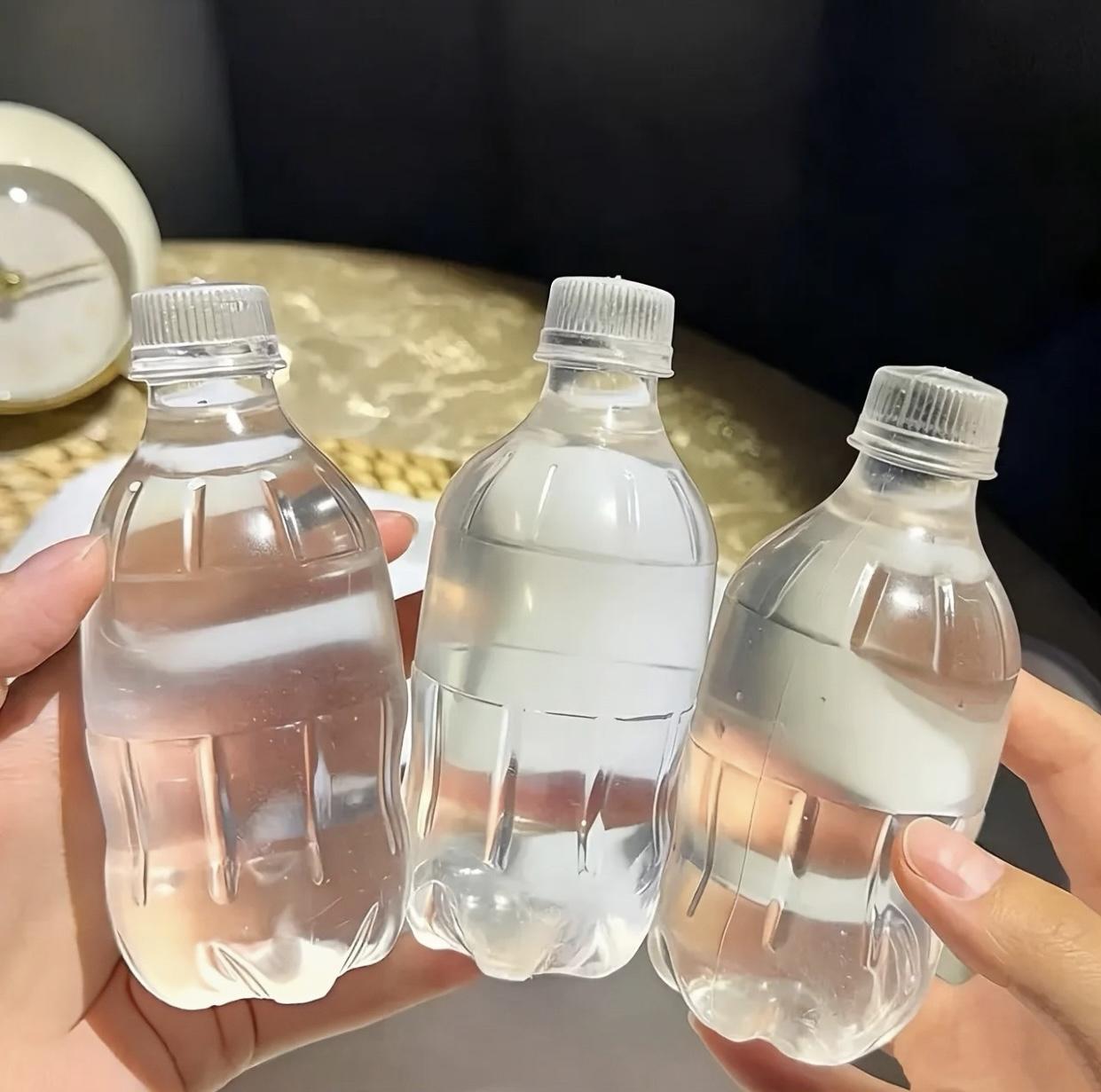 Slow Rising Squishy Water Bottle Fidget Toy - Soft Plastic Unisex Stress Relief Sensory Toy, Ideal Fidgeting Gift for Kids & Adults
