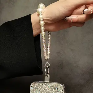 A exquisite handmade pearl wrist strap, equipped with sparkling stones, fashionable anti lost phone hanging accessories, luxurious glitter phone case, camera, and CD