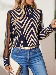 A ladies' geometric print patchwork netting long-sleeved high-neck blouse with elegant style and versatile appeal