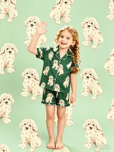 2-Piece Kids Set with Green Base Puppy Pattern Print Short Sleeve Shorts Soft and Comfortable Skin-Friendly Flap Design Button Closure Elastic Waistband Suitable for Year-Round Home Daily Casual Kids' Sleepwear Pajamas Set, Cartoon Pattern Pajamas