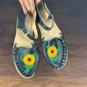 Huaraches - Black Buckle Huaraches with Sunflower Design Handcrafted Sandals Featuring Vibrant Floral Embroidery