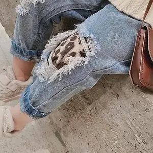 Leopard Rip Jeans - Detailed Description Provided