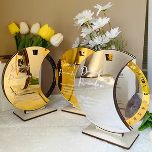 Golden desktop calendar stand with festive atmosphere decoration for home use.