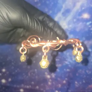 copper wrapped copper bangles with gold bells