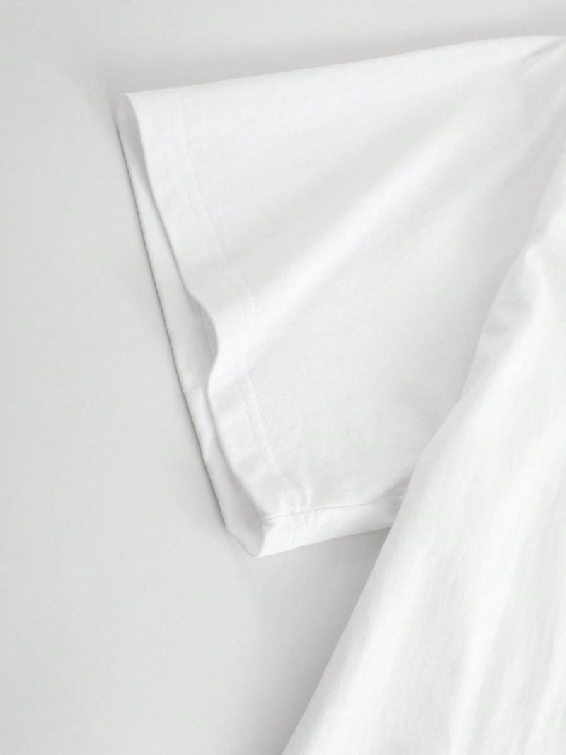 Camiseta blanca holgada para hombre con la palabra "BLESSED" y una cruz estampadas | Camisa informal de manga corta, cuello redondo, corte holgado, apta para todas las estaciones, apropiada para eventos religiosos y para uso diario.